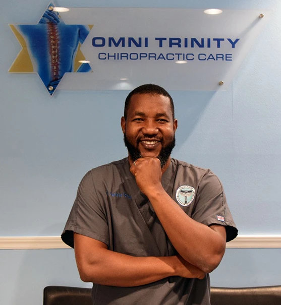 Chiropractor in clinic setting.